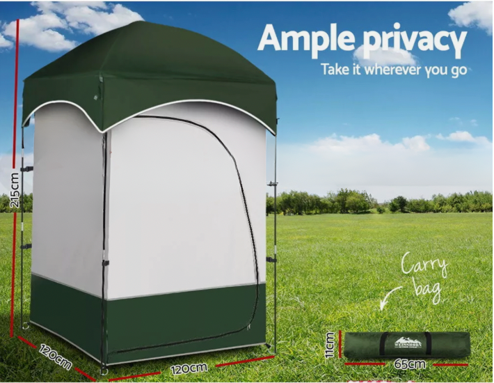 Compact shower tent set up on grass for outdoor use