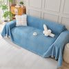 Pet-friendly blue couch cover designed for comfort and sofa protection