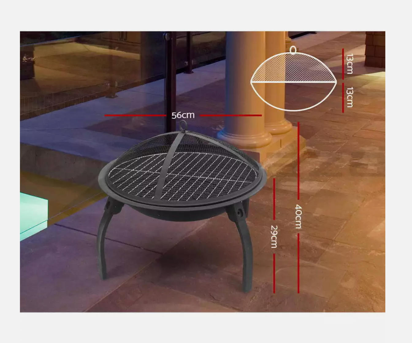 Round outdoor fire pit with grill top used in backyard patio for warmth and cooking.