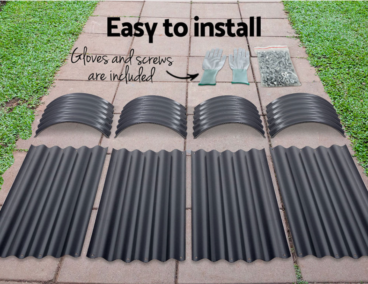 Raised garden bed with corrugated steel panels on grass