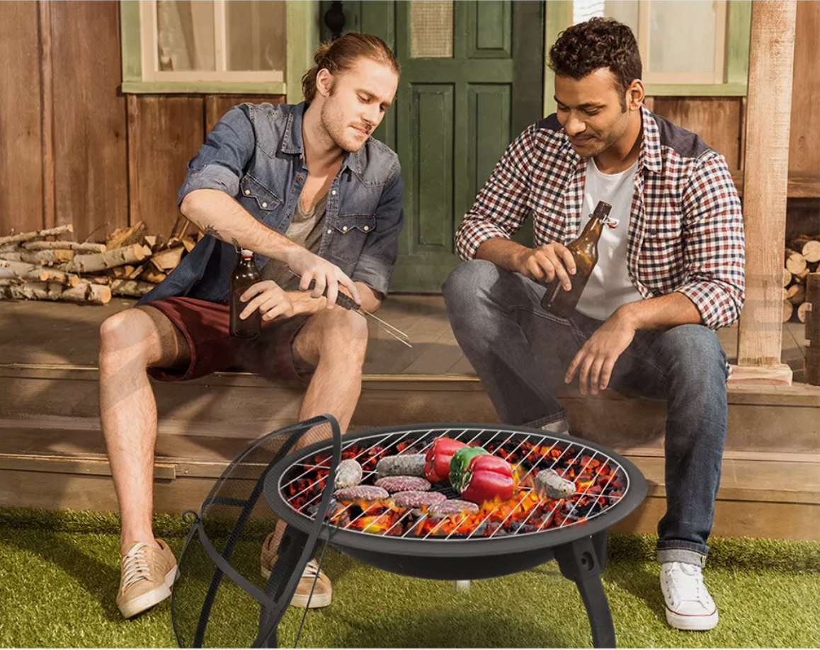 Friends gathered around outdoor fire pit with barbecue grill function.
