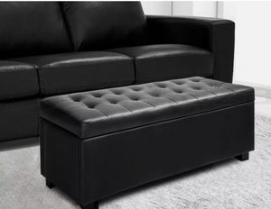 Black ottoman storage box with cushioned lid for living room