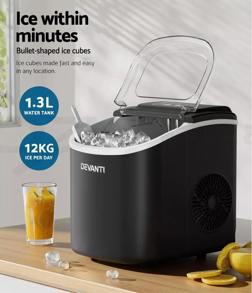 Portable black ice maker machine producing bullet ice cubes for beverages.